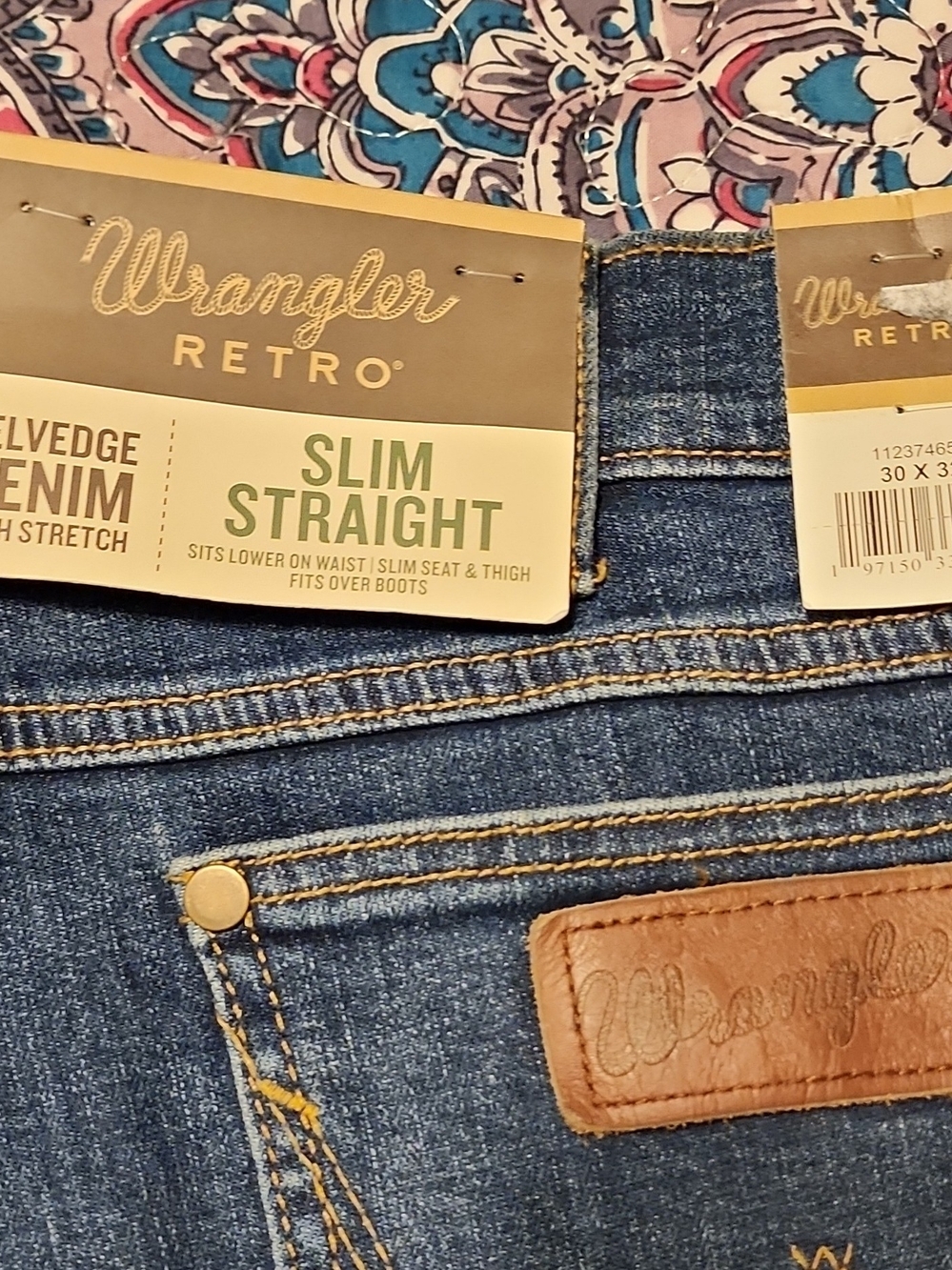 Wrangler Blue Slim Straight men's Jeans with Tan Leather Patch